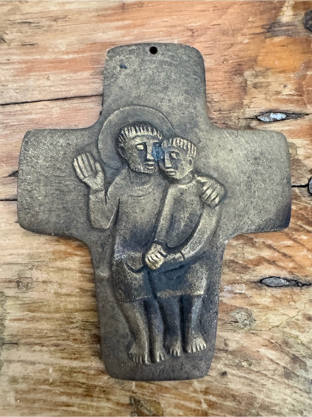 Bronze wall cross crucifix depicting the Disciples of Emmaus by Egino Weinert